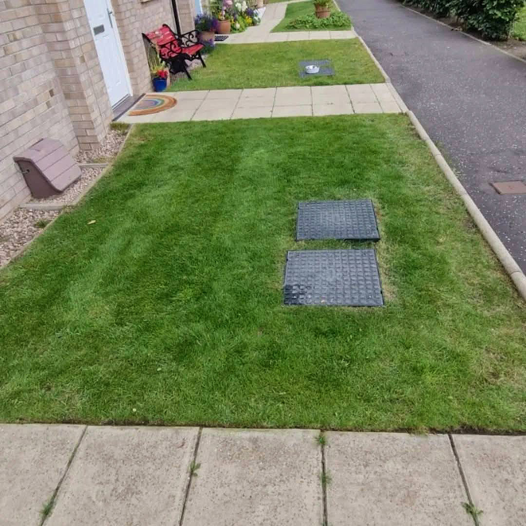 Communal grass area neat and green after maintenance