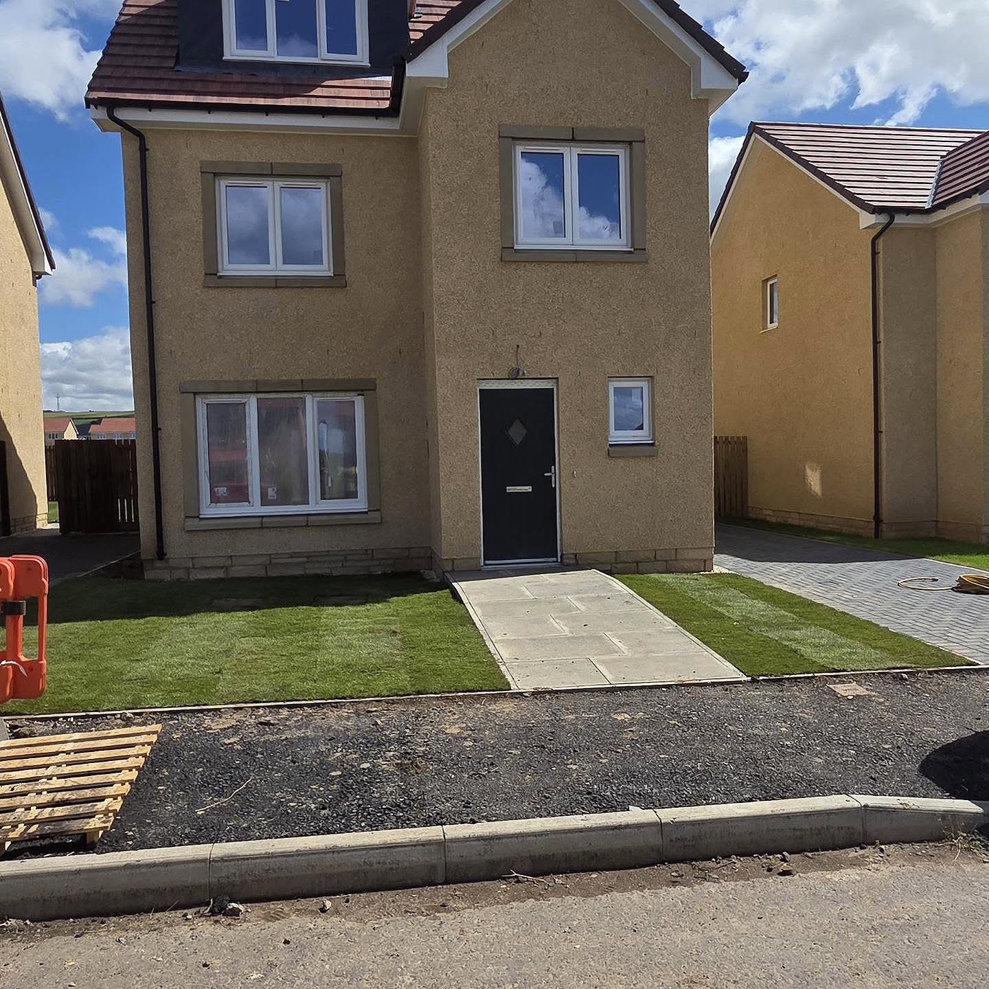 Tidied front garden and new path at a new-build property