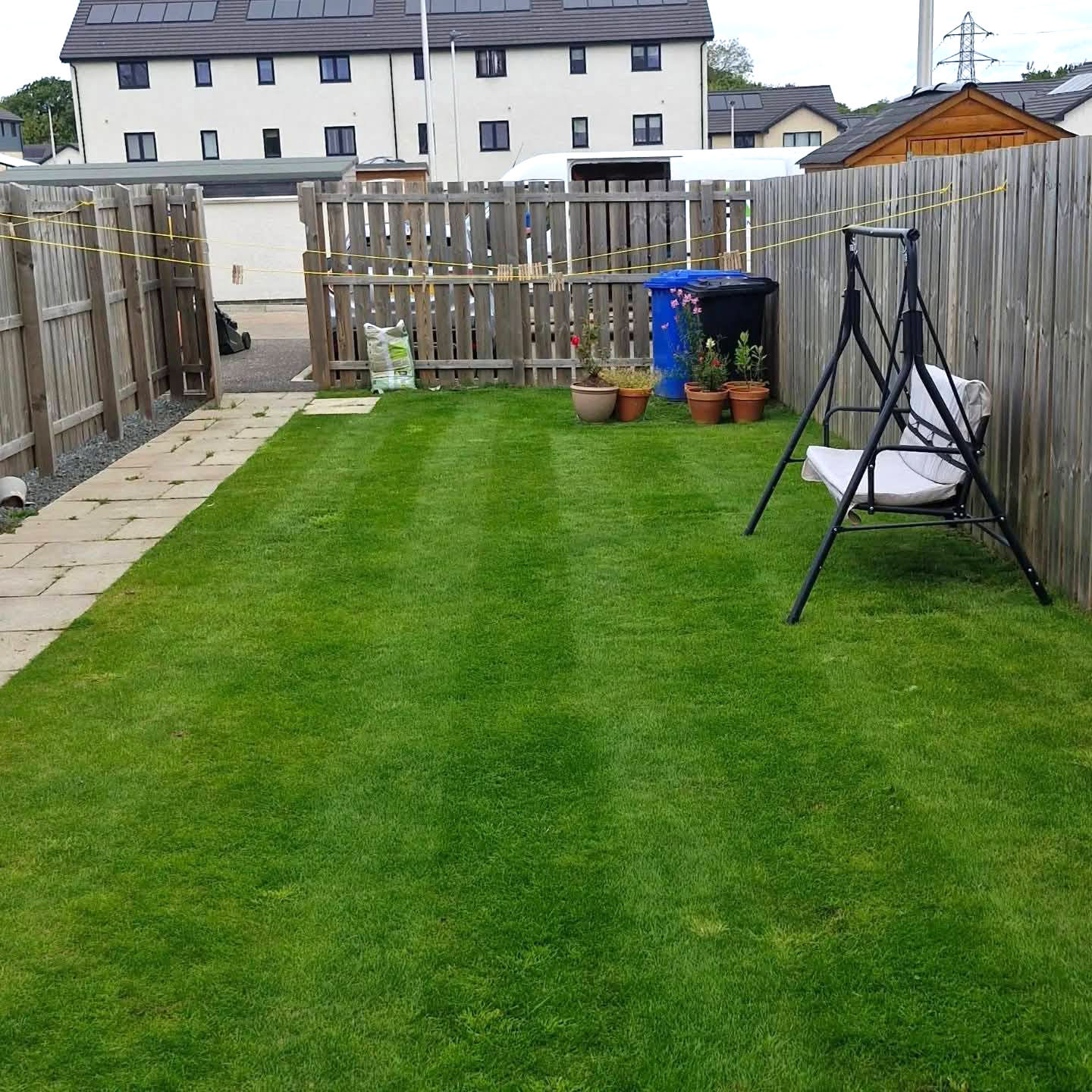 Regularly maintained lawn in an enclosed rear garden
