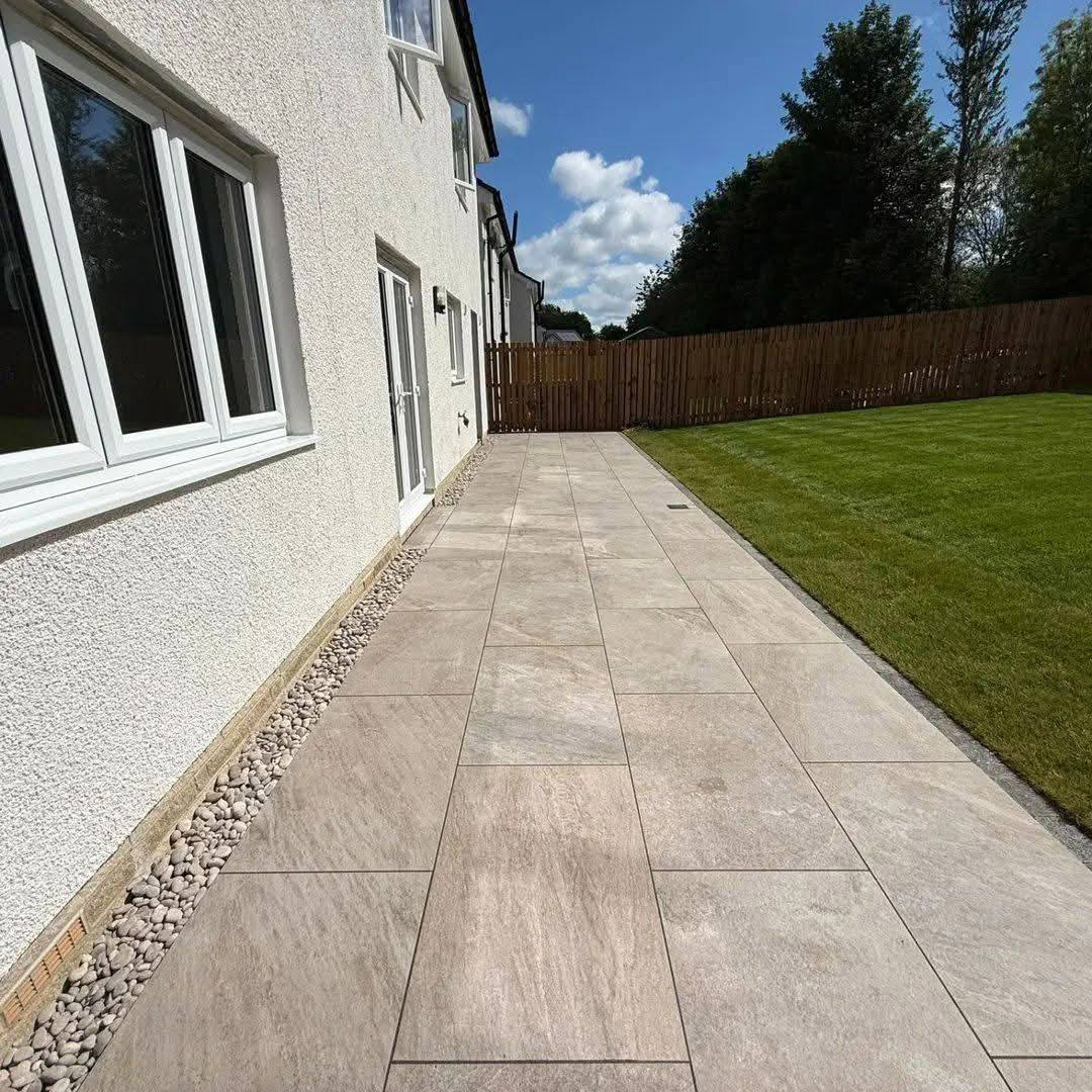New porcelain patio laid alongside the house