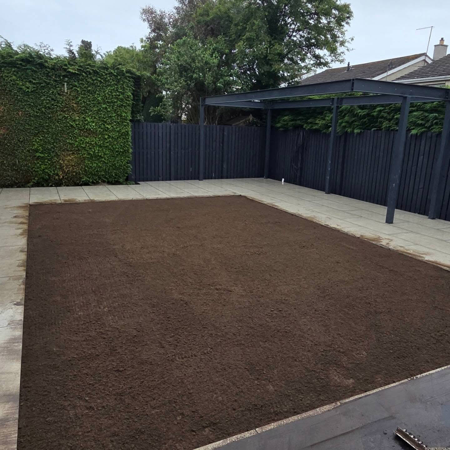 Rootzone raked level and ready for turf in an Eskbank garden